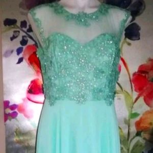 Mint green long sleeveless formal dress